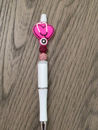 Image 1 of Stethoscope pink pen 