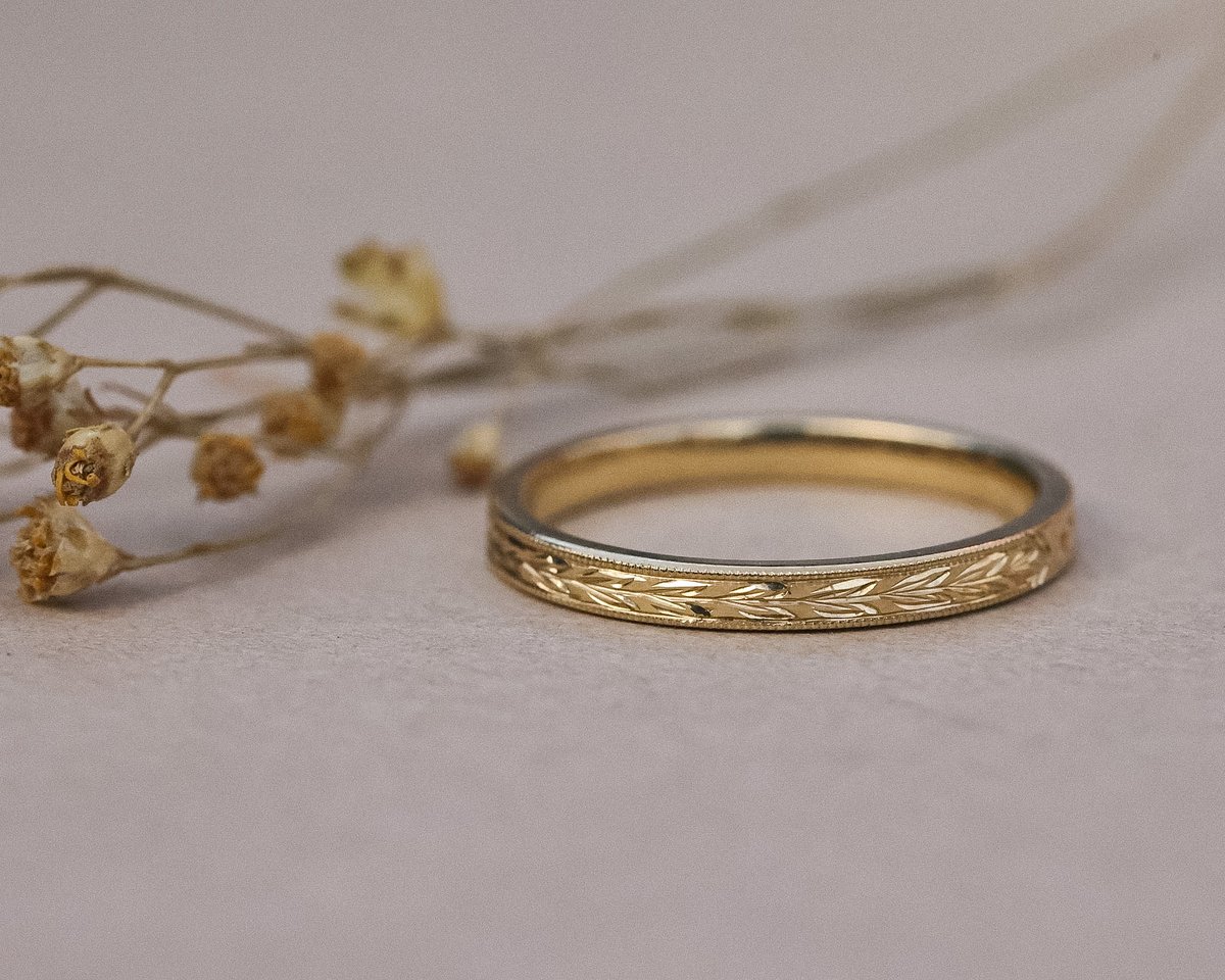 Image of 18ct Yellow gold, 2mm flat court Olive leaf and milled edge engraved ring