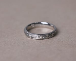 Image of Platinum 3mm ‘Olive leaf’ and milled edge engraved ring