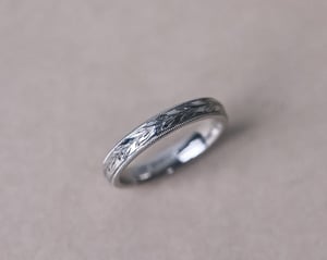 Image of Platinum 3mm ‘Olive leaf’ and milled edge engraved ring
