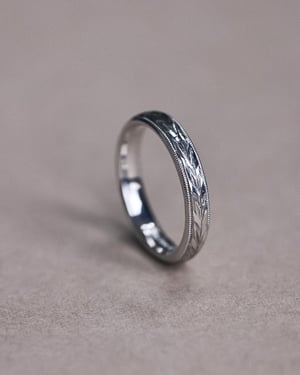 Image of Platinum 3mm ‘Olive leaf’ and milled edge engraved ring