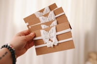 Image 2 of White tieback duo 