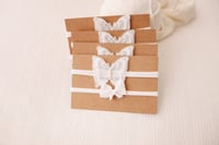 Image 3 of White tieback duo 