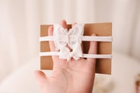 Image 1 of White tieback duo 
