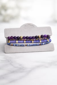 Image 1 of Gold and Purple Stack
