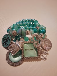 Image 1 of Ti & co bling