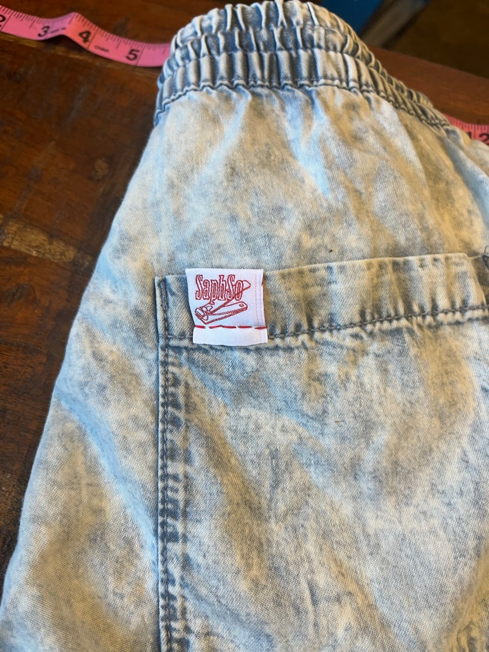 S KITTY THUMPERS BLUE TINSEL SHORTS BACK POCKET W/ LOGO TAG
