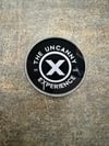 The Uncanny Experience Acrylic Pin