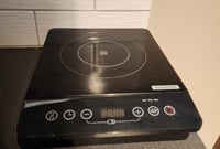 Image 2 of Tramontina cooktop and skillet