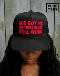 Image 1 of God got me, but these hands still work (Snapback) Black/Red