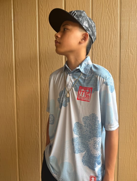 Image of PAISLEY SAKURA BLUE DRI FIT POLO SHIRT 