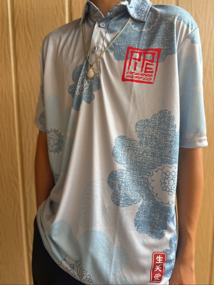 Image of PAISLEY SAKURA BLUE DRI FIT POLO SHIRT 