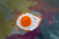Image 1 of glass fried egg