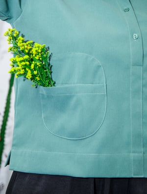 Image of Blusa bolsillo redondo aguamarina by El otro tigre