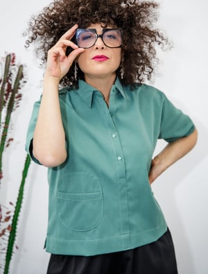 Image of Blusa bolsillo redondo aguamarina by El otro tigre