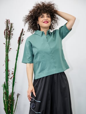 Image of Blusa bolsillo redondo aguamarina by El otro tigre