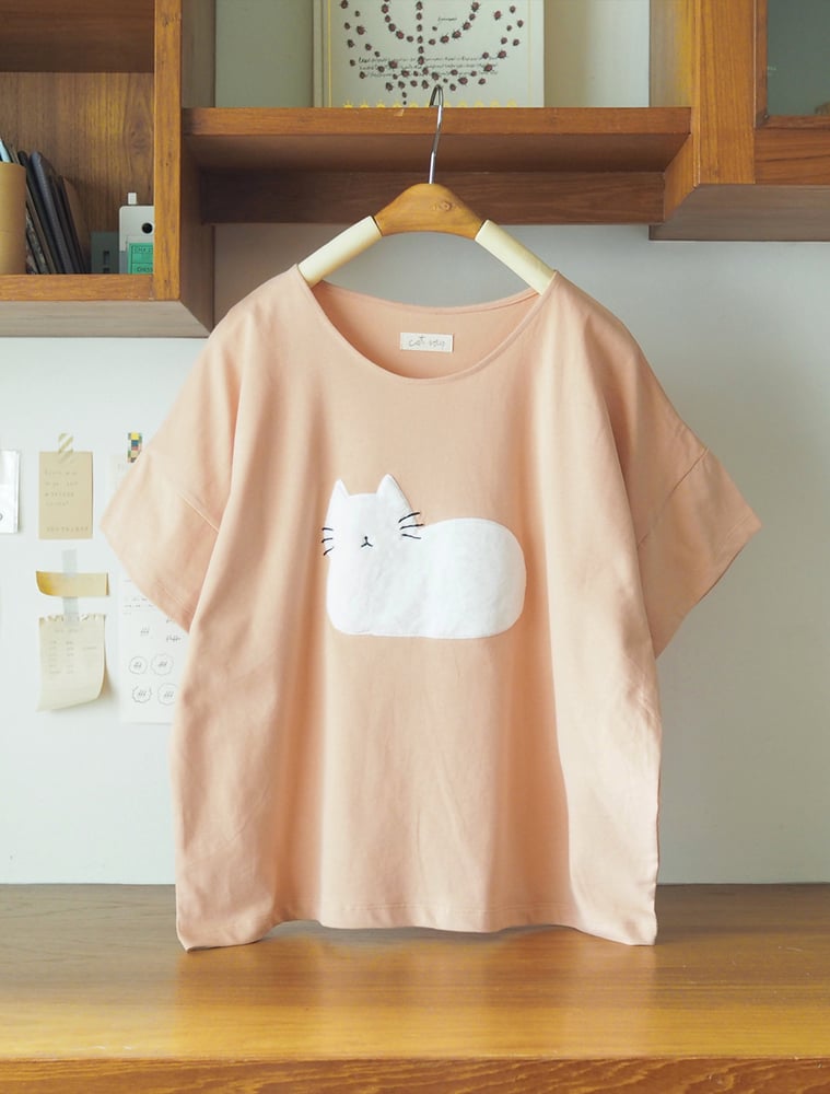Image of Camiseta gato peluche naranja pastel