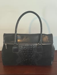 Image 1 of Black satchel with zipper closure