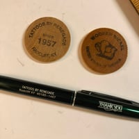 Image 1 of Renegade wooden nickels and pen 
