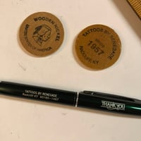 Image 2 of Renegade wooden nickels and pen 