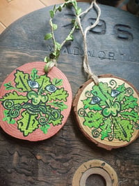 Green man wood slice