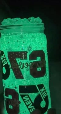 Image 1 of Glow in dark snowglobe & lid with ice