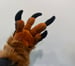Image of Dino Handpaws