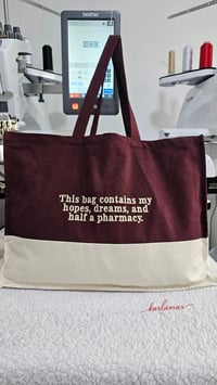 This bag contains my hopes, dreams, and half a pharmacy bag