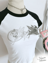 Image 1 of Devil & Angel Deer Baby Tee | Black and White Fawn Art on Women's Raglan Cropped Shirt