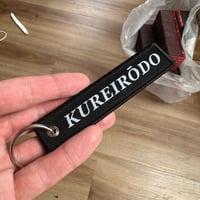KUREIRODO Jet Tag Keychain