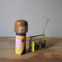 Image 10 of girl with an 80's boombox