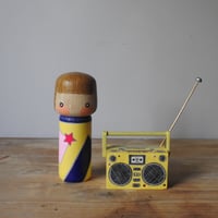 Image 13 of girl with an 80's boombox