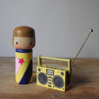 Image 2 of girl with an 80's boombox