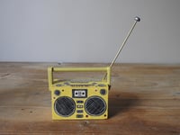 Image 12 of girl with an 80's boombox