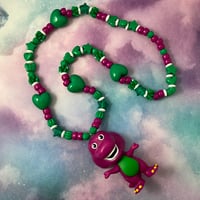 Image 1 of Purple Cartoon Dinosaur Kandi Necklace