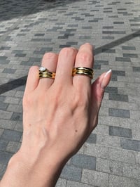 Image 4 of The Elara Triple-Band Marquise Ring