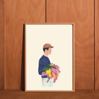 lámina del chico que lleva tulipanes