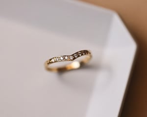 Image of 18ct Yellow gold white diamond set wishbone semi-eternity ring