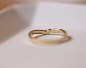 Image of 18ct Yellow gold white diamond set wishbone semi-eternity ring