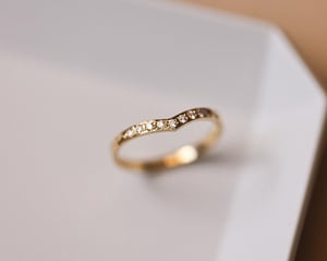 Image of 18ct Yellow gold white diamond set wishbone semi-eternity ring