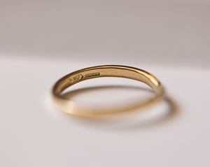 Image of 18ct Yellow gold white diamond set wishbone semi-eternity ring