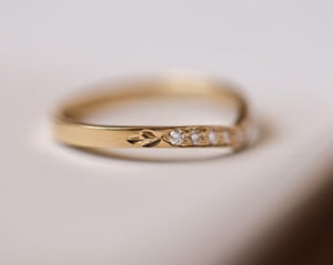 Image of 18ct Yellow gold white diamond set wishbone semi-eternity ring