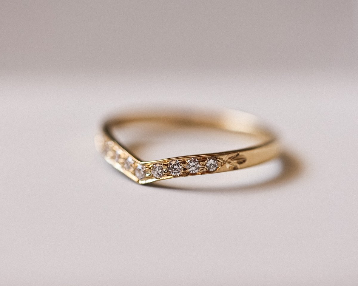 Image of 18ct Yellow gold white diamond set wishbone semi-eternity ring