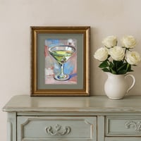 Image 3 of Сocktail in a clear glass with an olive. 