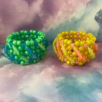 Image 2 of Spaghetti Twist GITD Kandi Cuff