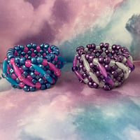 Image 3 of Spaghetti Twist GITD Kandi Cuff