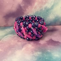Image 5 of Spaghetti Twist GITD Kandi Cuff