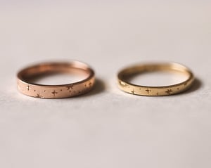 Image of 18ct Yellow gold 2mm ‘Star' Eternity ring