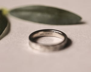 Image of Platinum 4mm ‘Olive leaf’ engraved flat court ring in matte finish