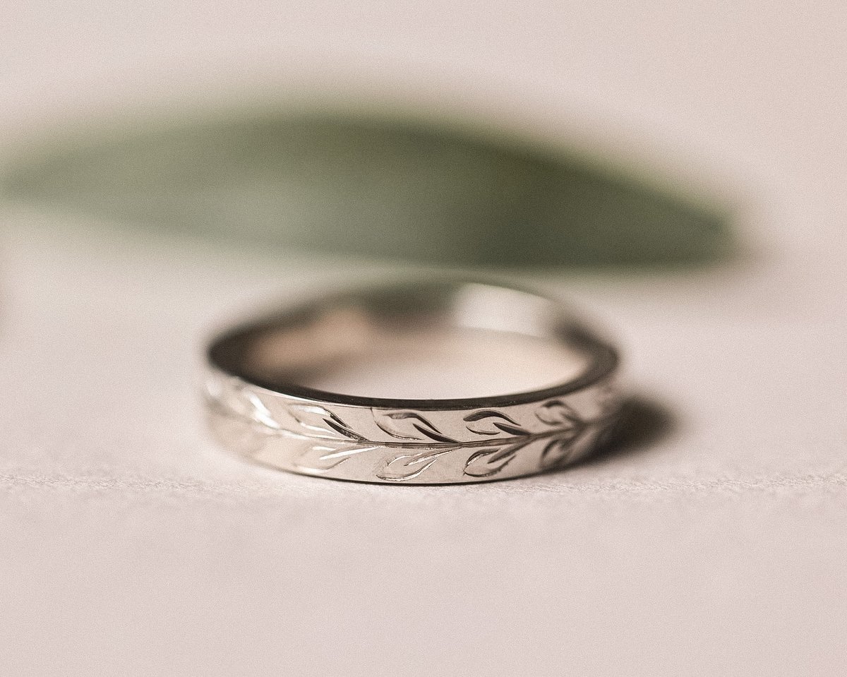 Image of Platinum 4mm ‘Olive leaf’ engraved flat court ring in matte finish